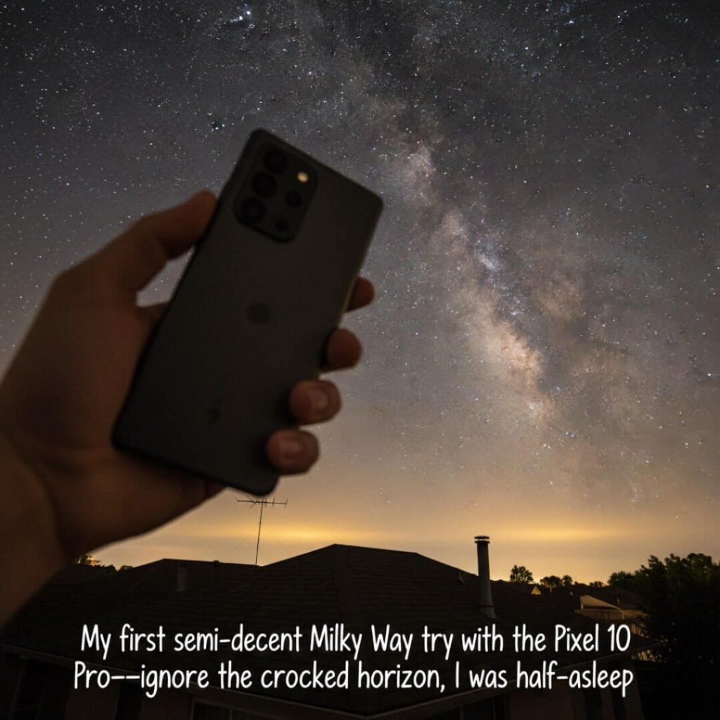 my shaky hand holding a phone pointed at a starry sky over a suburban rooftop, with city light pollution bleeding in—caption: "My first semi-decent Milky 